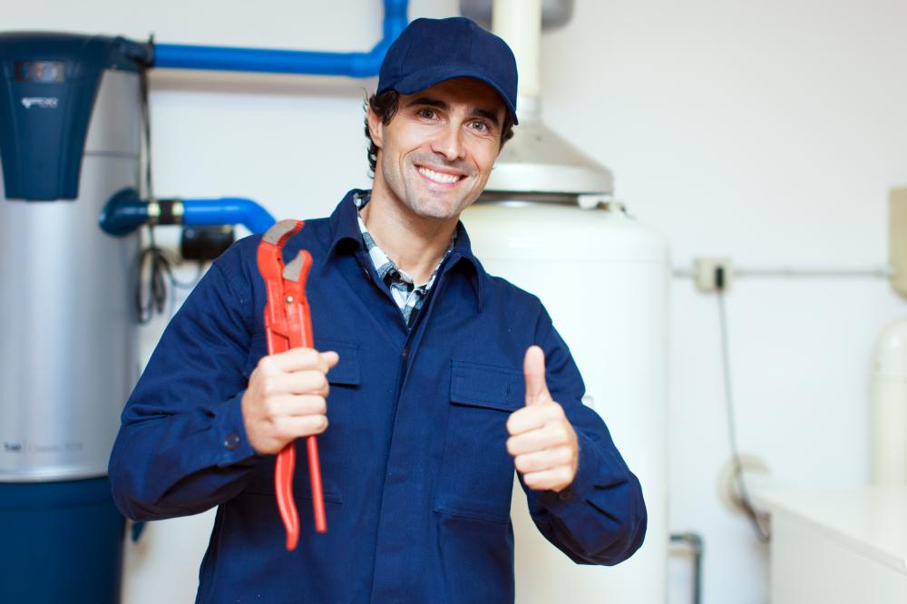 A plumber fixing water softener in Gilbert