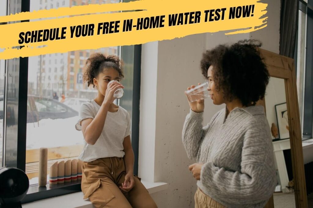 Two girls drinking pure and clean water