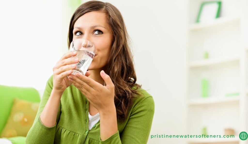 A woman drinking healthy soft water